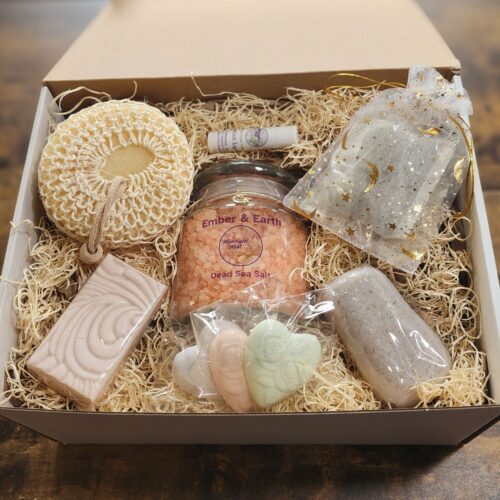 Close up of Signature Gift Box filled with patchouli dead sea salts, body scrub, patchouli soap and sachet